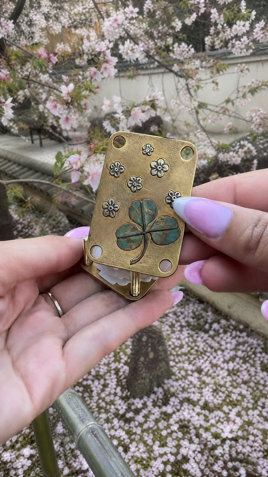 TravelPetals pocket flower press on a trip